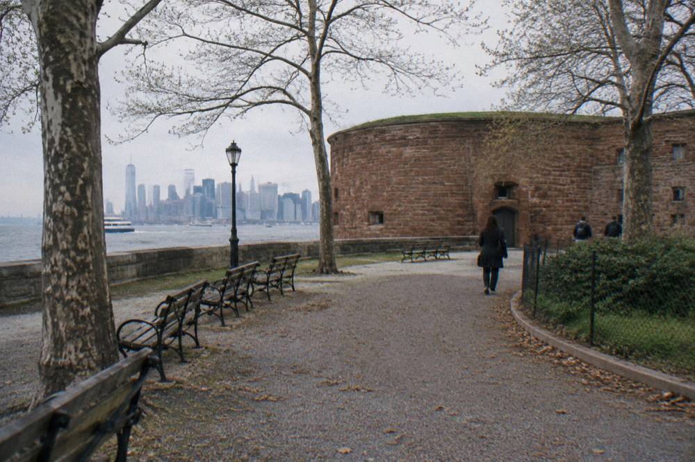 A crowd-free view of Castle Clinton in the Battery with the harbor behind it